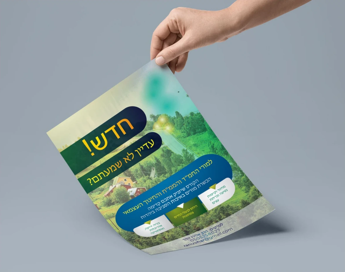 Green flyer for an environmental association, held by a hand.